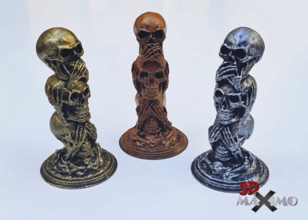 Calaveras los tres monos sabios con efecto metálico